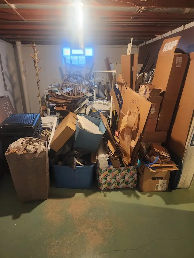 Roll-off dumpster container at job site for Yard Waste Dumpster Rental in Van Buren